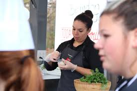 Mobile kitchen stops at local middle school to promote healthy cooking