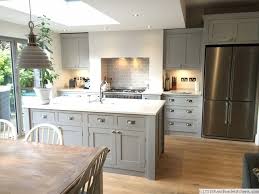 It also allows for uninterrupted conversation, as you can prep food at the working island while talking to those sitting at the other island. Island With Sink Layout Drawer Cups Mounted On Square Plate Kitchen Design Kitchen Interior Living Room Kitchen