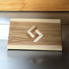 Tried something different to help make my edge grain cutting boards stand  out. The inlay is maple and cherry. Inlay pieces are 1/2” thick.