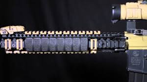 Easily cut for custom lengths, sections can mount next to each other to form a visually continuous cover. Magpul Xt Rail Texture Panel Black