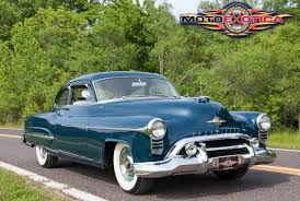 Image result for Algerian Blue 1928 Oldsmobile