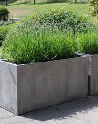 Filling up this entire planter would be a complete waste of money and materials….but popping in a box and having it rest on the supports is the perfect solution. Trough Planters And Rectangle Planter Boxes In Design Iota Australia