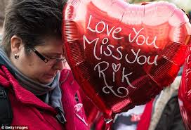 Rik Mayall's children gather for unveiling of memorial bench in Hammersmith 