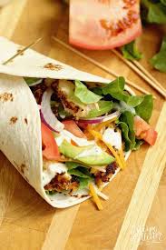Crispy Chicken Wrap Stuffed With Panko Coated Chicken Diced Tomatoes Sliced Red Onion Avocado Shredded Crispy Chicken Wraps Chicken Wraps Crispy Chicken
