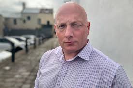 Telstra apologises to family of Victorian who died during outage at  national triple-0 call centre