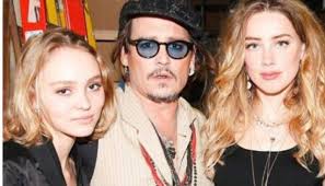 What does Lily-Rose Depp think of her dad's ex, Amber Heard? The Chanel  ambassador didn't attend their wedding and has supported Johnny Depp in the  court case from day one