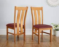 Oak selections nutmeg brown with light oak tops and seats dining room set with oval table. Churchill Red Leather Solid Oak Dining Chair