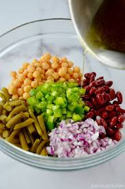 In a large bowl, add all three types of beans, the onion, and parsley. Classic Three Bean Salad Just A Taste