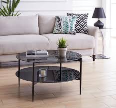 Couchtisch Elenoire Couchtisch In Edler Optik Mit Ablageboden Aus Glas In 2020 Couchtisch Tisch Und Couchtisch Mit Rollen