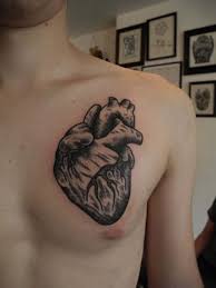 Disgusting for some, appealing for others, anatomical heart tattoos are in trend nowadays. Black Anatomical Heart Tattoo On The Chest Tattoogrid Net