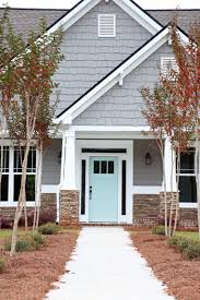 Grey house with blue door. Home Sweet Home Addison S Wonderland
