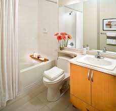 The layout has two separate sinks along different walls, allowing each person to have their space for toiletries. 7 Awesome Layouts That Will Make Your Small Bathroom More Usable