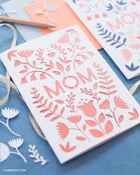 Add a bit of glue on one end of the paper strip, and stick the ends together, forming a teardrop loop. Create Your Own Papercut Mother S Day Card For Your Mom Happy Mother S Day Diy Card Mothers Day Cards Mother S Day Diy