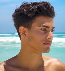 1.8 high fade with shape up and curly hair; 15 Best Hairstyles For Teenage Guys With Wavy Hair