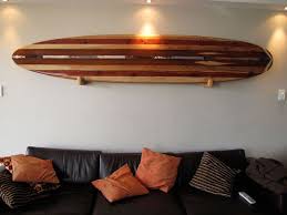 Decorating With The Surfboard Catch The Decorating Wave With Surfboard Decor Surfboard Decor Surfboard Wall Surfboard Wall Art