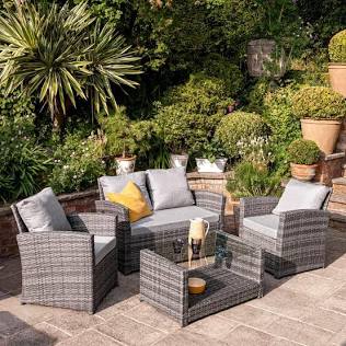 Rattan garden furniture dining sets on display, AI generated