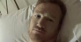 Dancing On Ice star Greg Rutherford speaks from hospital to say he is 'very  sore'