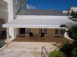 Talius Is The Largest Awning Manufacturer In North America Using Superior Swela Fabric Swela Fabrics Are Coated With A Teflon Fi Awning Patio Covered Patio