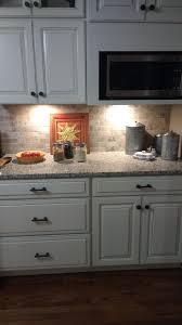 Cotton With Carrara Glaze Cabinets By Thomasville White Sand Granite And Silver Travertine Subway Tiles Kitchen Redo Kitchen Remodel Kitchen