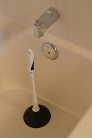 Clogged bath tub drain prevention. How To Use A Plunger Bath Arxiusarquitectura