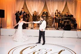 Black And White Dance Floor Wedding White Dance Floor With Gold Wedding Monogram And Amber Uplighting Gold Black And White W Ivory Wedding Decor White Weddings Reception Orange County Wedding