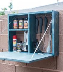 For The Dad Who Loves To Braai This Wall Mounted Storage Cabinet Is The Perfect Gift Made Us Outdoor Grill Station Outdoor Grill Area Backyard Grilling Area