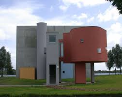 Residential house / home being prepared for exterior painting with windows covered / masked with plastic and several ladders against. Ad Classics Wall House 2 John Hejduk Thomas Muller Van Raimann Architekten Otonomo Architecten Archdaily