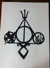 Pin By Julia Mccuaig On Drawing Book Tattoo Ideas Book Tattoo Percy Jackson Tattoo