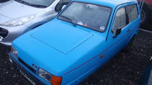 Image result for Racing Yellow 1994 Reliant