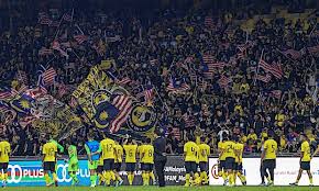 Di mana tergambar sosok harimau sedang melompati bola seakan hendak menerkam. Penyokong Harimau Malaya Dinasihat Berakhlak Baik Yayasan Dakwah Islamiah Malaysia