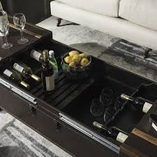 It is the perfect centerpiece to have a cup of tea with friends or to settle down with a glass of wine while enjoying your favorite book or tv show. Zoe Coffee Table Storage Trunk With Wine Rack English Elm