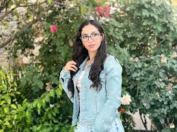 Mariam is wearing a selection of frames by Struktur Eyewear -