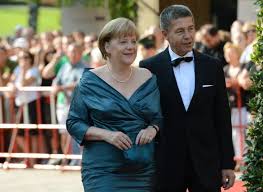 German chancellor looks miserable as she dons walking boots for holiday in angela merkel pictured with husband joachim sauer while on hiking holiday the pair were spotted in the italian resort town of solda, in the ortles mountains Angela Merkel Photo 4 20
