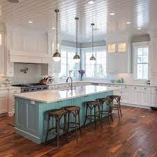 A moody blue island from source unknown (please share, if you know) gorgeous stained and distressed kitchen island from carla aston designed. Benjamin Moore Copper Mountain Design Decor Photos Pictures Ideas Inspiration Paint Colors And Rem Kitchen Island Cabinets Home Kitchens Kitchen Design