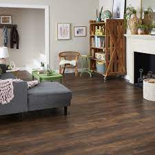 Frontier Oak Quick Step Studio Laminate Flooring At Lowe S Livingroom Laminate Flooring Oak Laminate Flooring Oak Floor Living Room