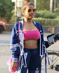 Sexy Poonam Pandey reveals a little too much in pink sports bra as she  steps out in the city- see pics
