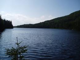 Boundary Pond In Pittsburg Nh Is Literally On The Boundary Of The Us And Canada This Wonderfully Remote Pond Is Home To Br Brook Trout New Hampshire Vacation
