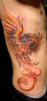 The bird itself is often represented as a colorful, iconic creature, surrounded by ashes and flame, or the bird being in flame itself. Phoenix Bird Tattoo Tattooimages Biz