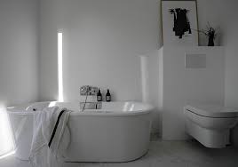 This tiny bathroom is made to feel much larger by the love the makeover of these bathrooms! Before After Our White Minimalist Bathroom Makeover Bodie And Fou Studio