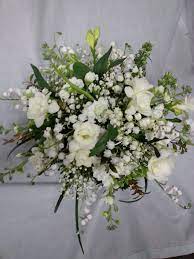 Classic White Flower Bouquet Freesia Stock Lily Of The Valley And Larkspur Fragrant And Fabulous Bouquet White Flower Bouquet White Flowers Flowers Bouquet