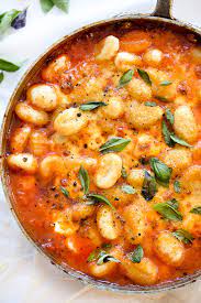 A platter of petite, potato pillows coated with glistening flecks of basil pesto. Gnocchi With Pomodoro Sauce Easy Flavorful Foodiecrush Com
