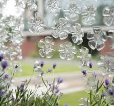 Michelle Brand Is An Environmental Designer Who Specializes In Upcycling Plastic Bottle Bottoms Int Plastic Bottle Crafts Bottle Crafts Plastic Bottle Flowers