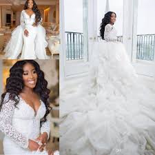It is so difficult to find such valuable dresses on the internet. New African Black Girl Mermaid Wedding Dresses Sweetheart Lace Appliques Long Sleeves Long Detachable Train Plus Size Formal Bridal Gowns