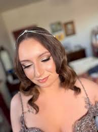 I know these are not real flowers but I'm interested in getting an exact  replica with real flowers- I'm wondering how much a bouquet like this would  cost? Anon cuz we haven't