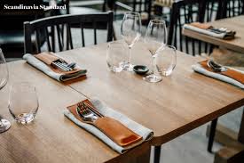 Fusing cuisine, cocktails and culture in a fashionable setting. Modern Restaurant Table Setting Novocom Top