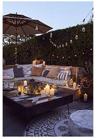 Spring Evenings Cosy Outdoor Seating Area Create That Cosy Evening Ambience In Your Back Garden And S Outdoor Candles Backyard Decor Outdoor Gardens Design