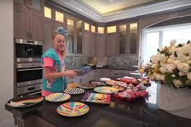 The omaha native's new living space already reflects her bubbly, colorful image — even though she and her family the corner of the room contains a collection of convenience store food machines, like a. Inside Internet Star Jojo Siwa S 3 43 Million L A Mansion Lonny