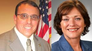 Captain says she was forced to retire after seen eating lunch with form  Sheriff John Darr