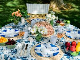 Bright place settings with mixed china, flower arrangement, and fun accents come together in creating this bold and festive table. Labor Day Party Ideas Let These Stunning Table Settings Inspire Your End Of Summer Soiree Vogue