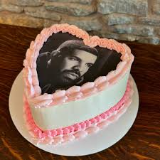 Drake Birthday cake! Chocolate cake with a chocolate fudgy filling topped  with a whipped cream cheese frosting. #CAKED #birthdaycake #heartcake  #chocolatecake #womanownedbusiness #smallbusiness